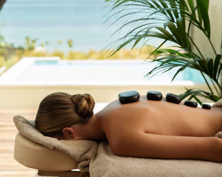Woman receiving a deep tissue massage at Kalkan spa