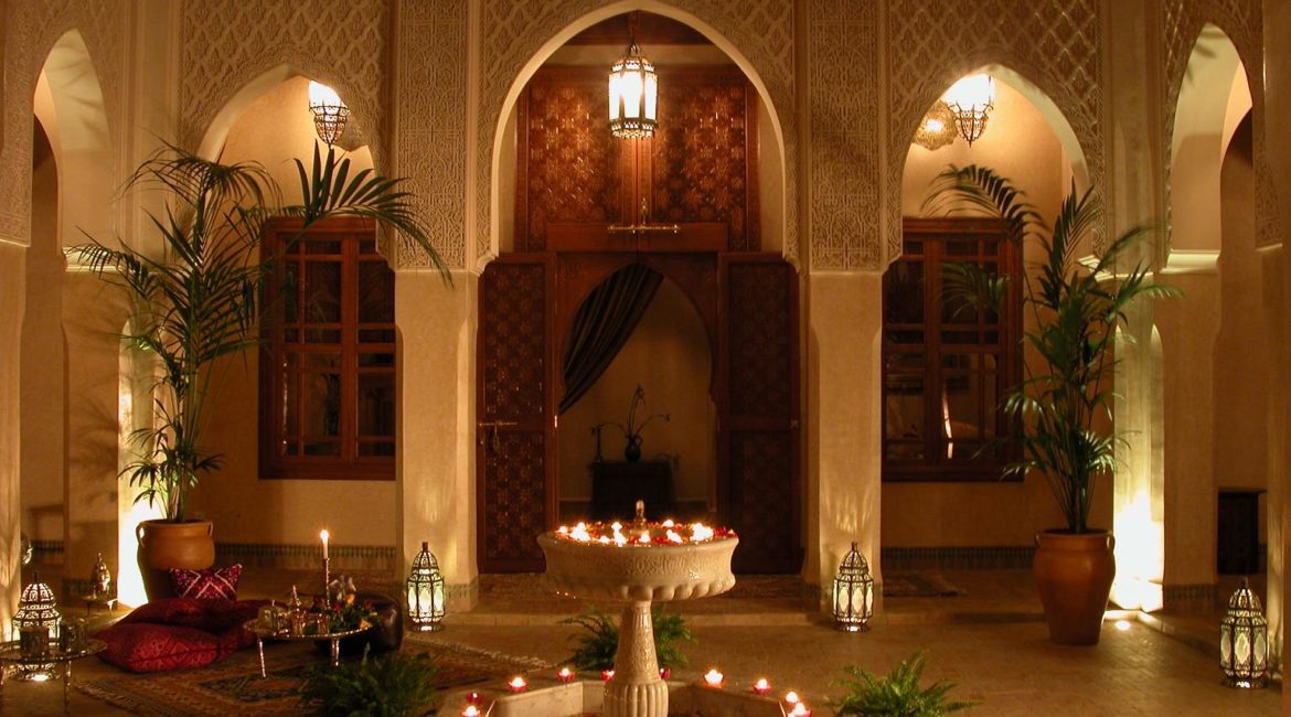 The patio at night at Riad Kniza