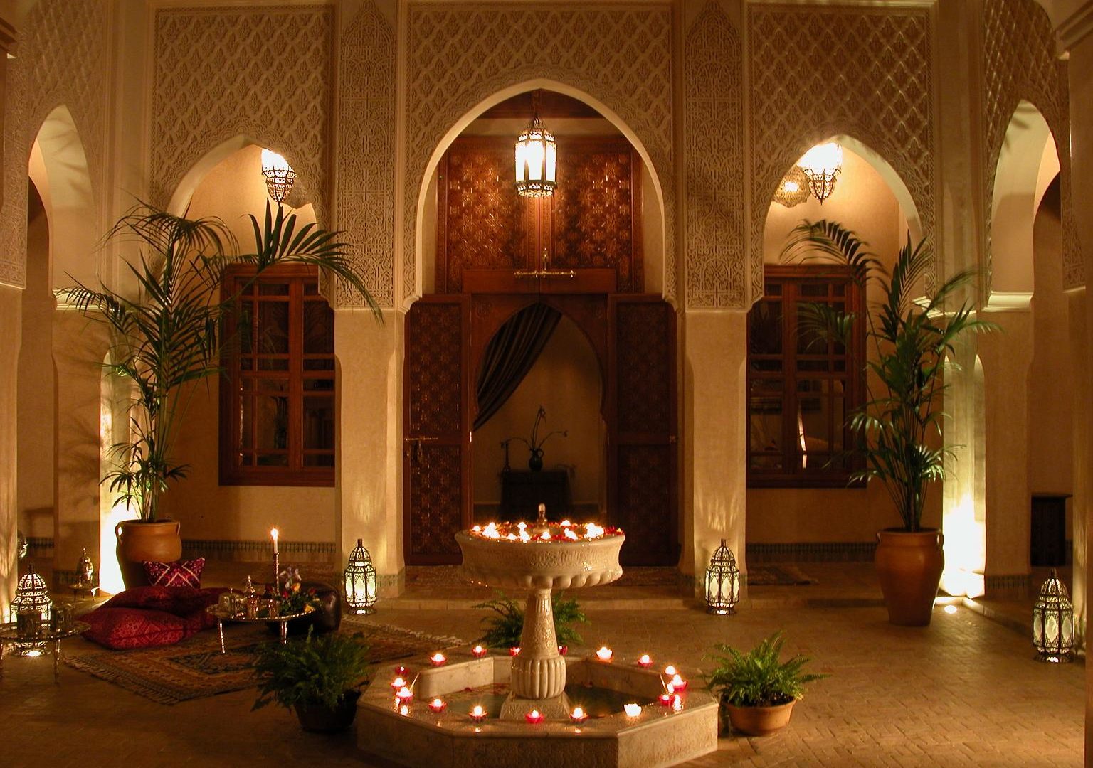 The patio at night at Riad Kniza