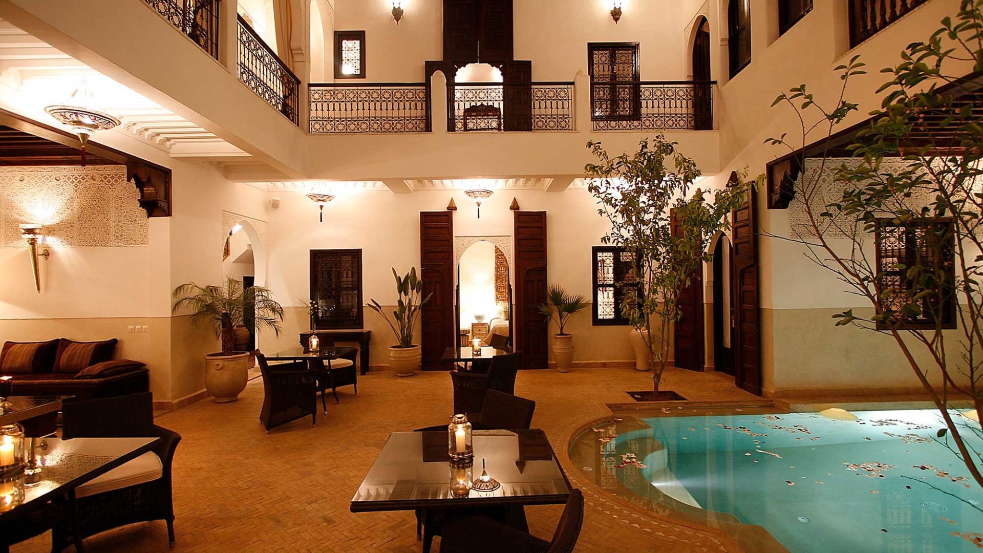 The courtyard and pool at Riad Assakina