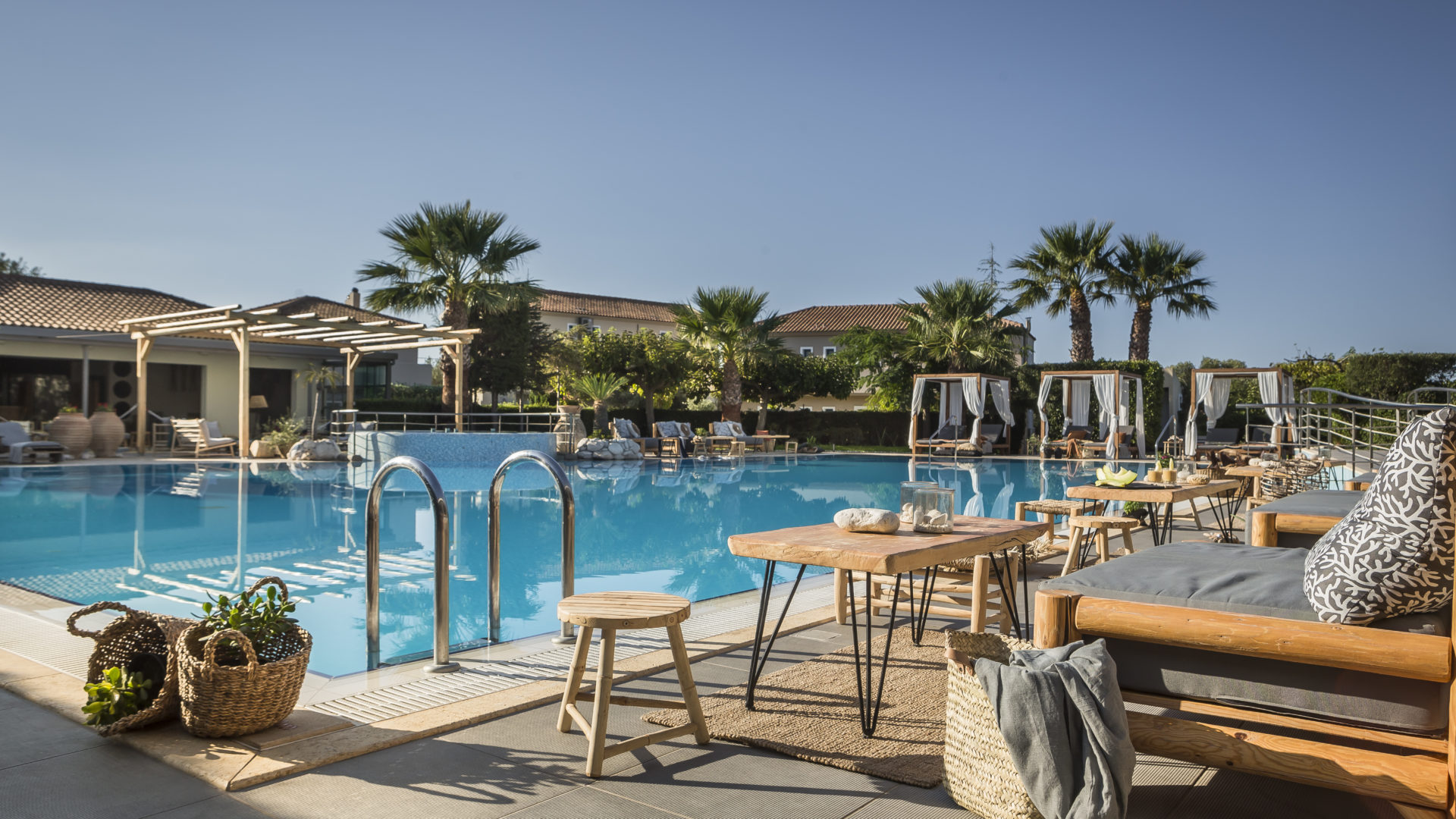 Avithos Resort pool and sunbeds