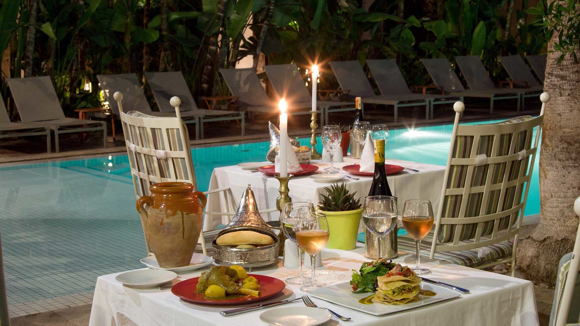 Dining by the poolside at Les Jardins de la Medina