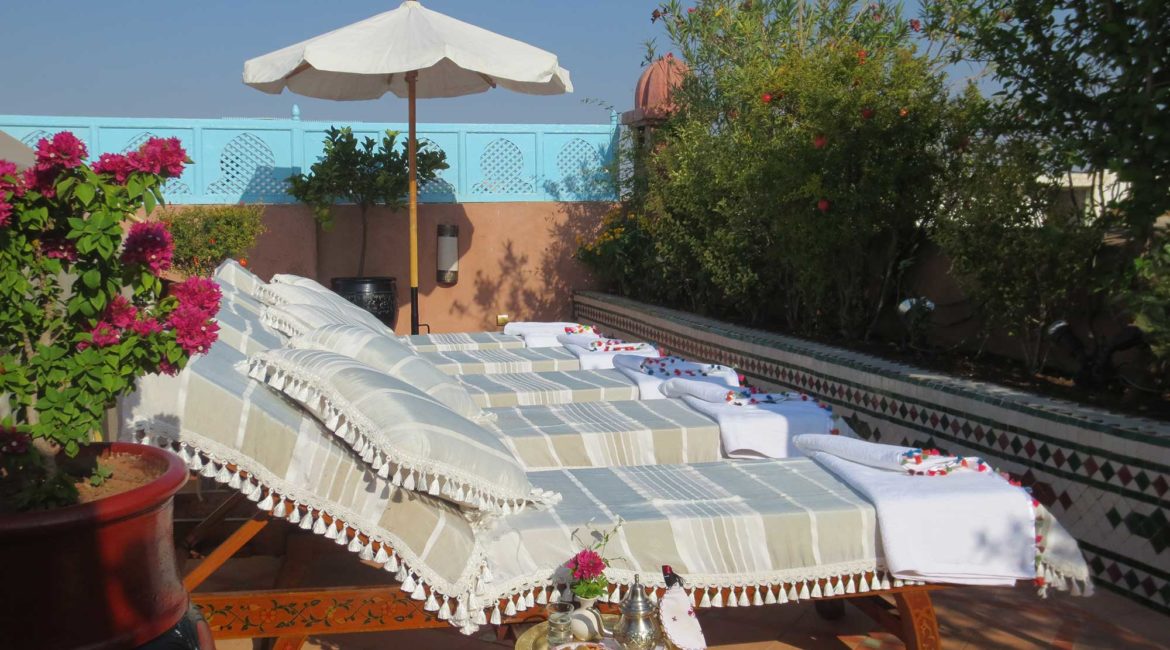 Sunbeds on the terrace at Riad Hikaya