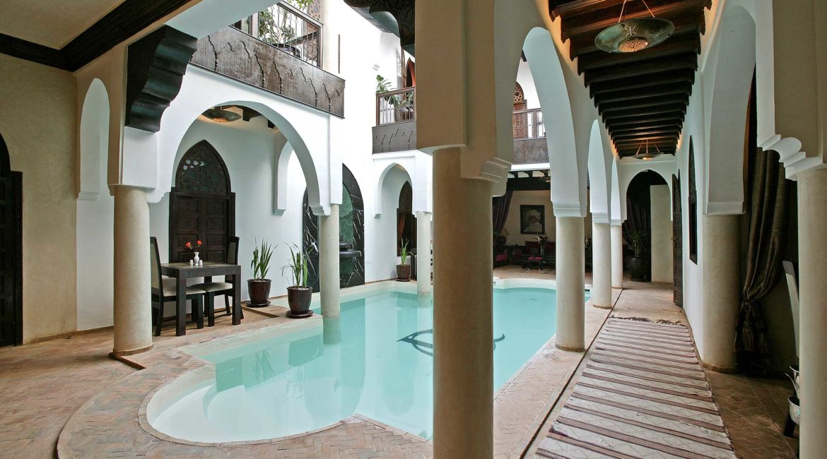 The pool and patio of Riad Opale