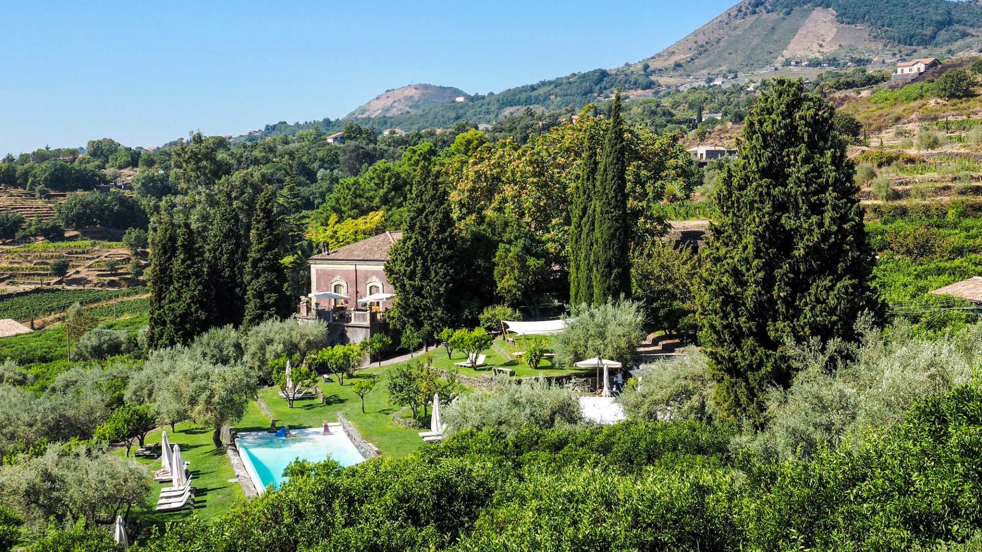 Beautiful grounds and pool at the Monaci della Terre Neri