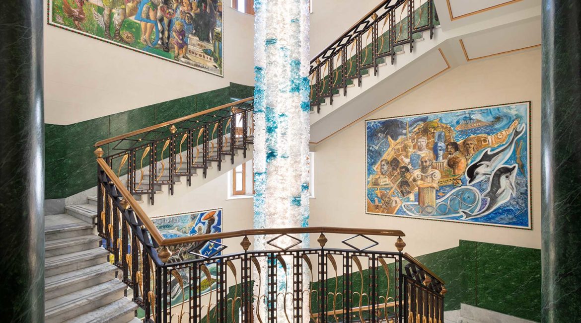 The beautifil marble staircase and Murano chandelier at Ortea Palace