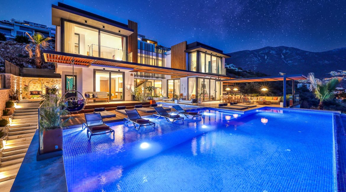 Villa Pax swimming pool and exterior by night
