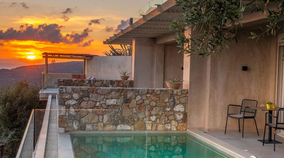 Apolis 1 bedroom premium suite with infinity edge swimming pool suites sunset views