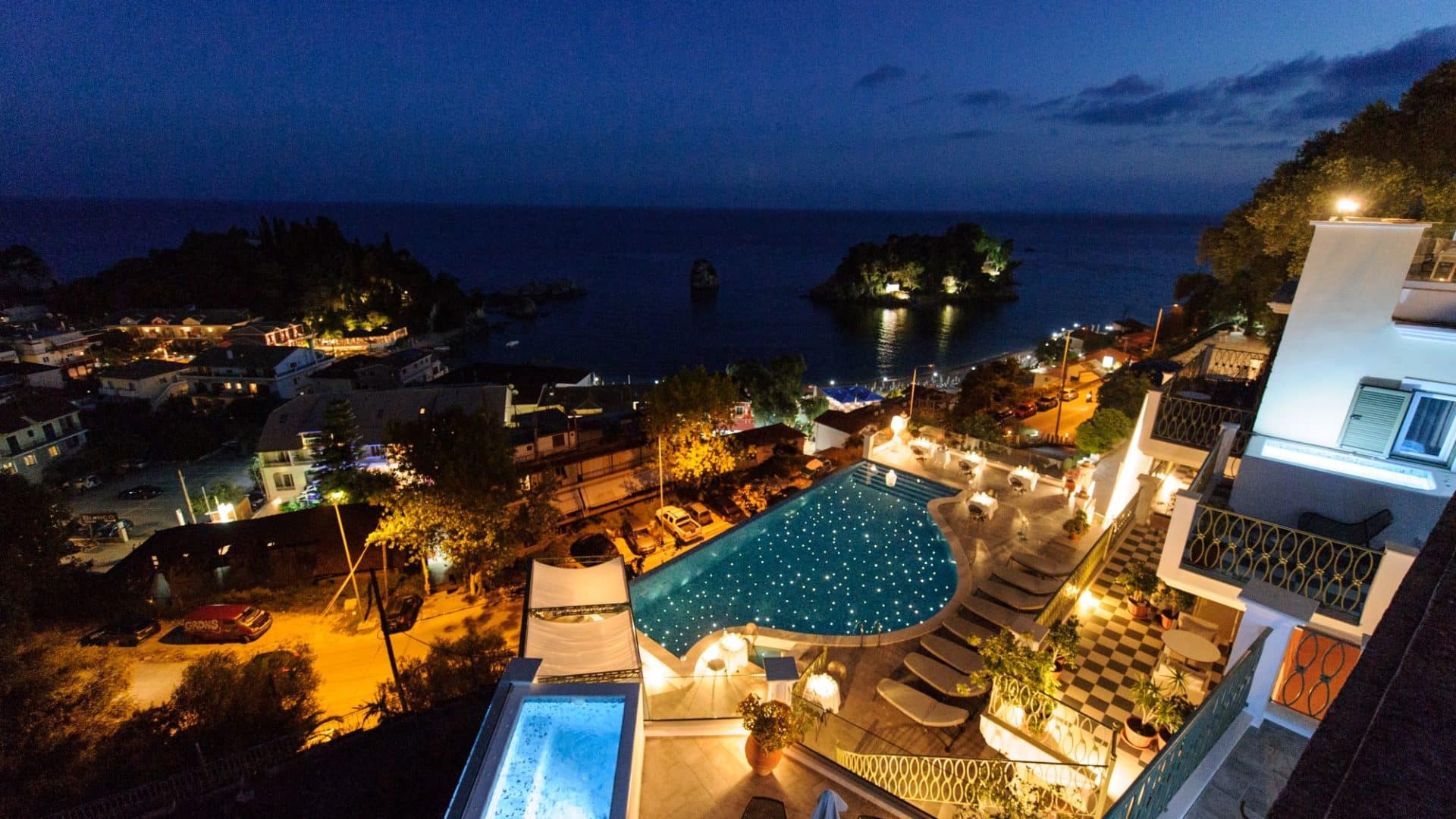 Irida Boutique Hotel and surrounding evening vistas of Parga