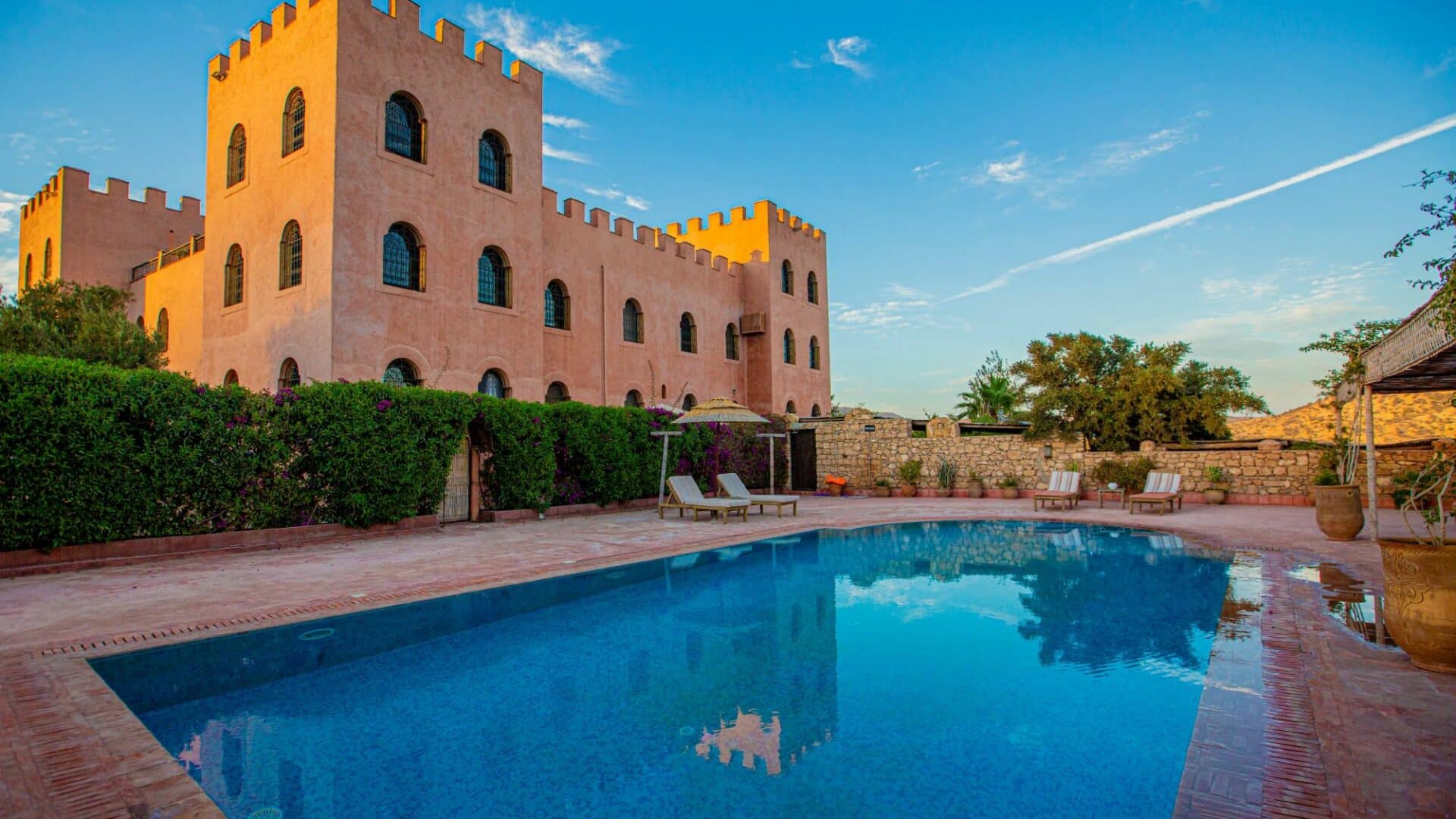 Atlas Kasbah pool and surrounding furnished terraces