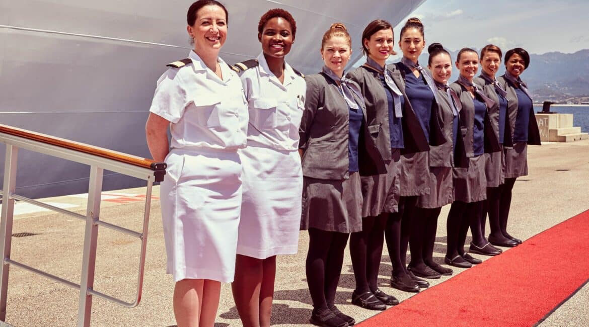 Seabourn Encore crew welcoming guests