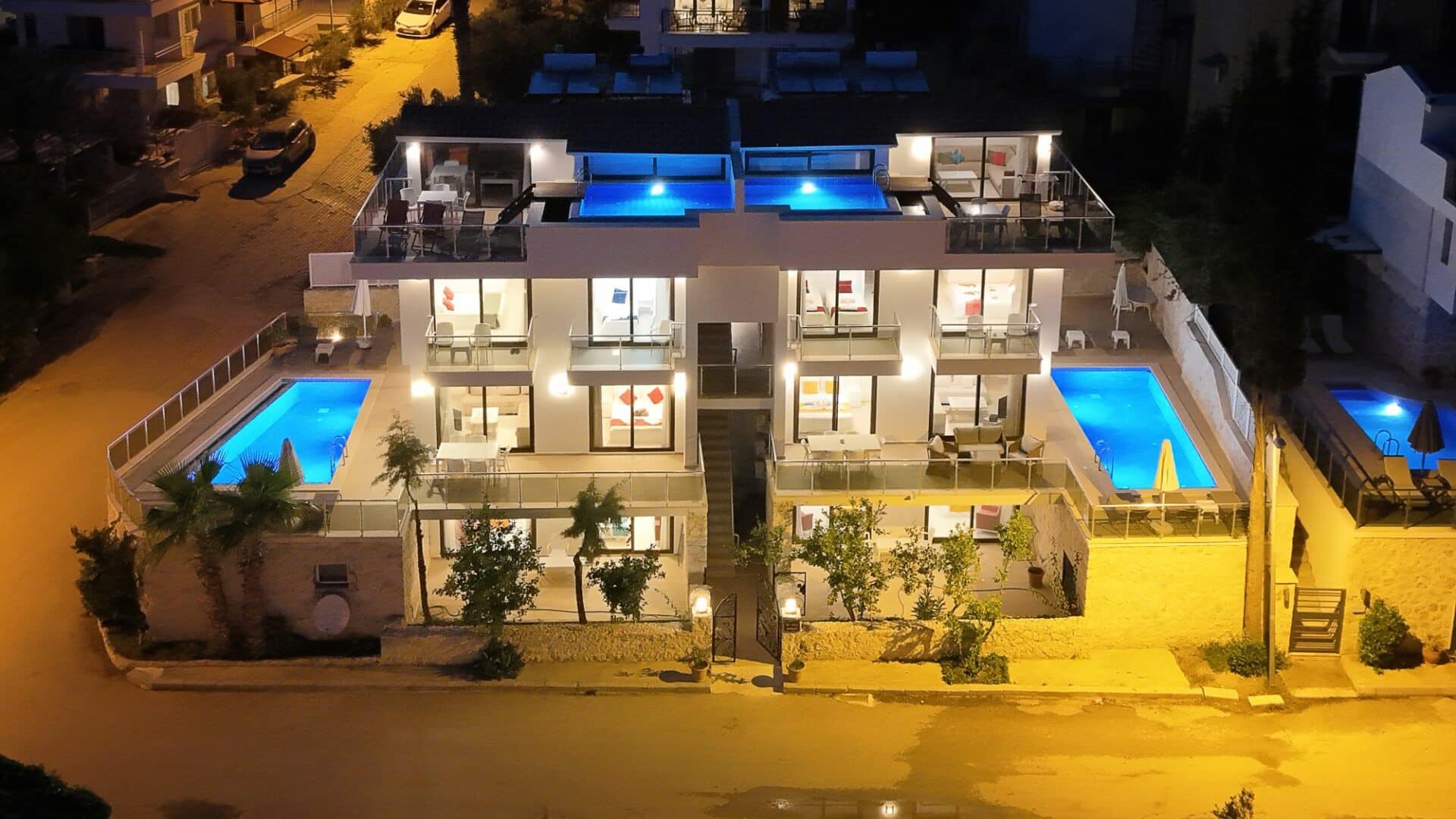 Iskele Apartments aerial at nightfall