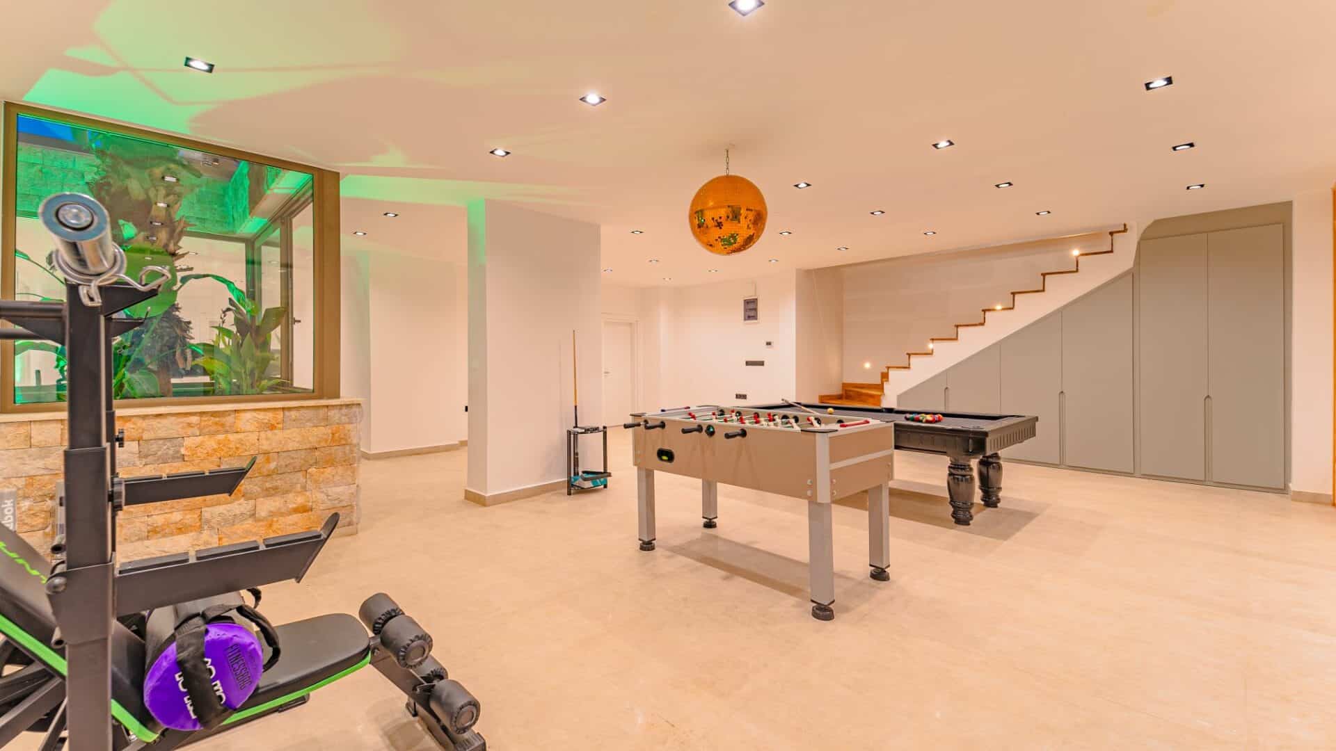 Villa Nobles Rox games room and gym equipment 2