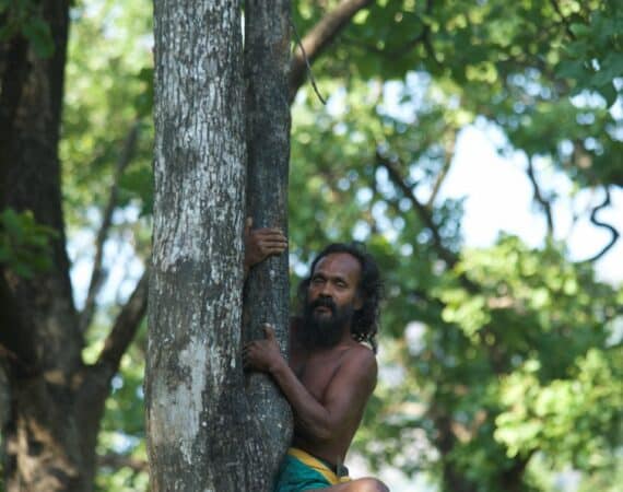 Vedda people of Gal Oya, Sri Lanka’s indigenous community, sharing traditions within the forest landscape.