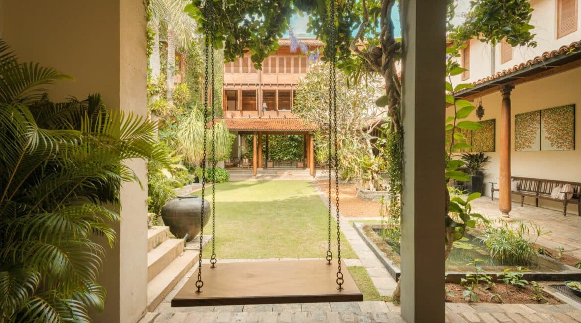 Courtyard swing at ISHQ Colombo, Sri Lanka – a peaceful spot framed by tropical greenery, perfect for quiet moments in this boutique city retreat.