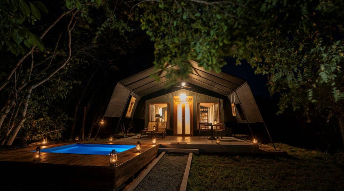 Leopard Trails Wilpattu National Park – Plunge Pool Suites at night, softly lit with ambient lighting, offering a luxurious safari glamping experience under the stars.