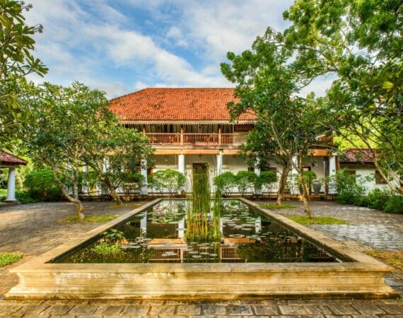 Utterly serene entrance to Uga Ulagalla, Sri Lanka, surrounded by tranquil ponds – boutique luxury hotel in the Cultural Triangle