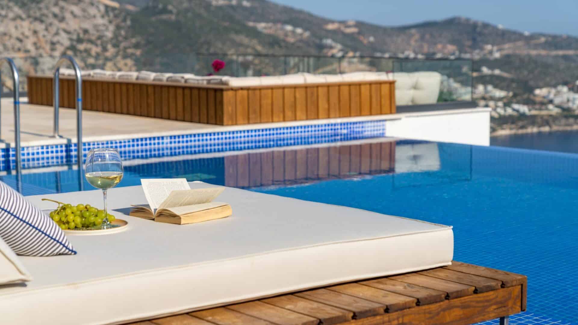 Villa Anatolia 3 Kalkan swimming pool and surrounding double day beds