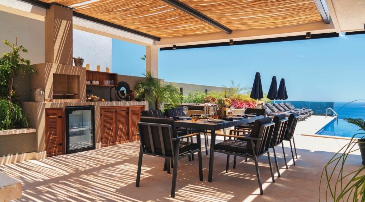 Villa Ayse Kalamar Bay alfreso dining terrace by day under the shade of a pergola