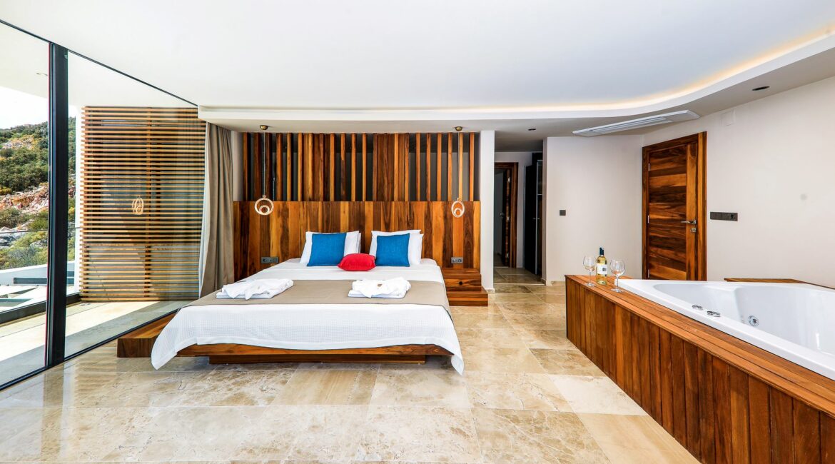 Villa Beverley Hills Kalkan large double bedroom a blend of wood glass and marble