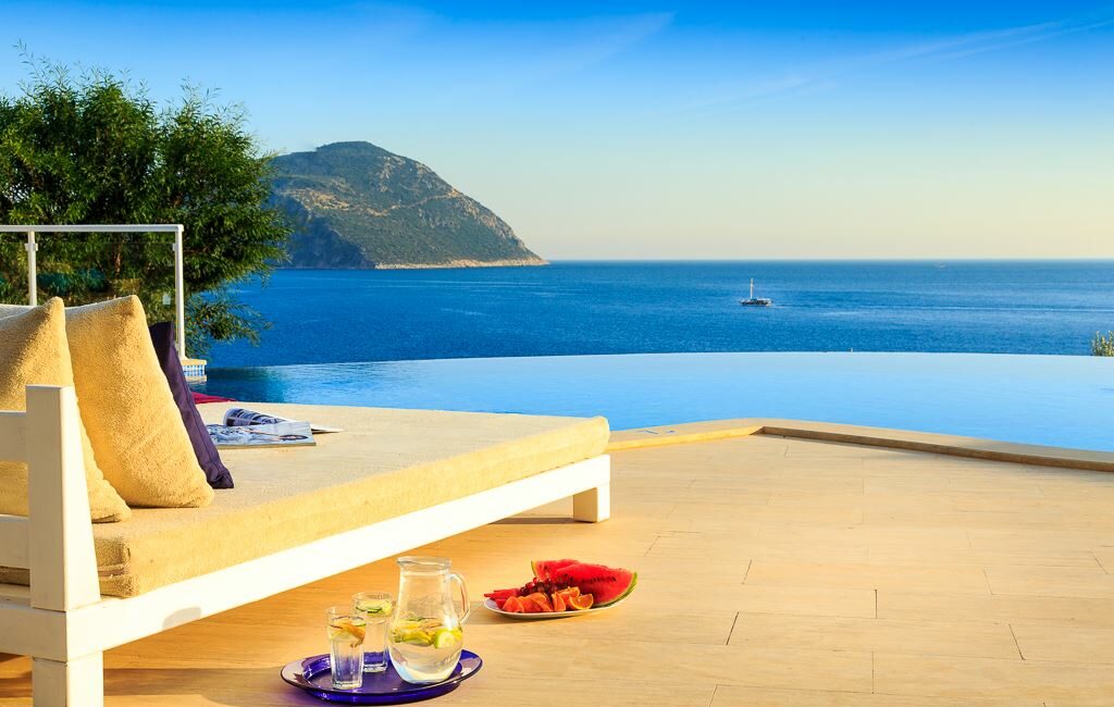 Villa Guney Exclusive in Kalkan loafing and lounging by the pool