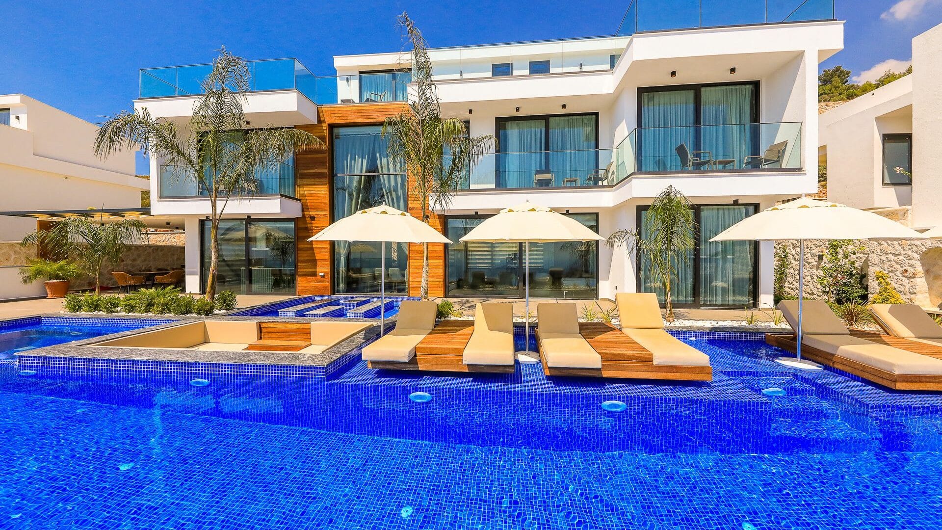 Villa Max View Elegant Exteriors Swimming Pool And Surrounds