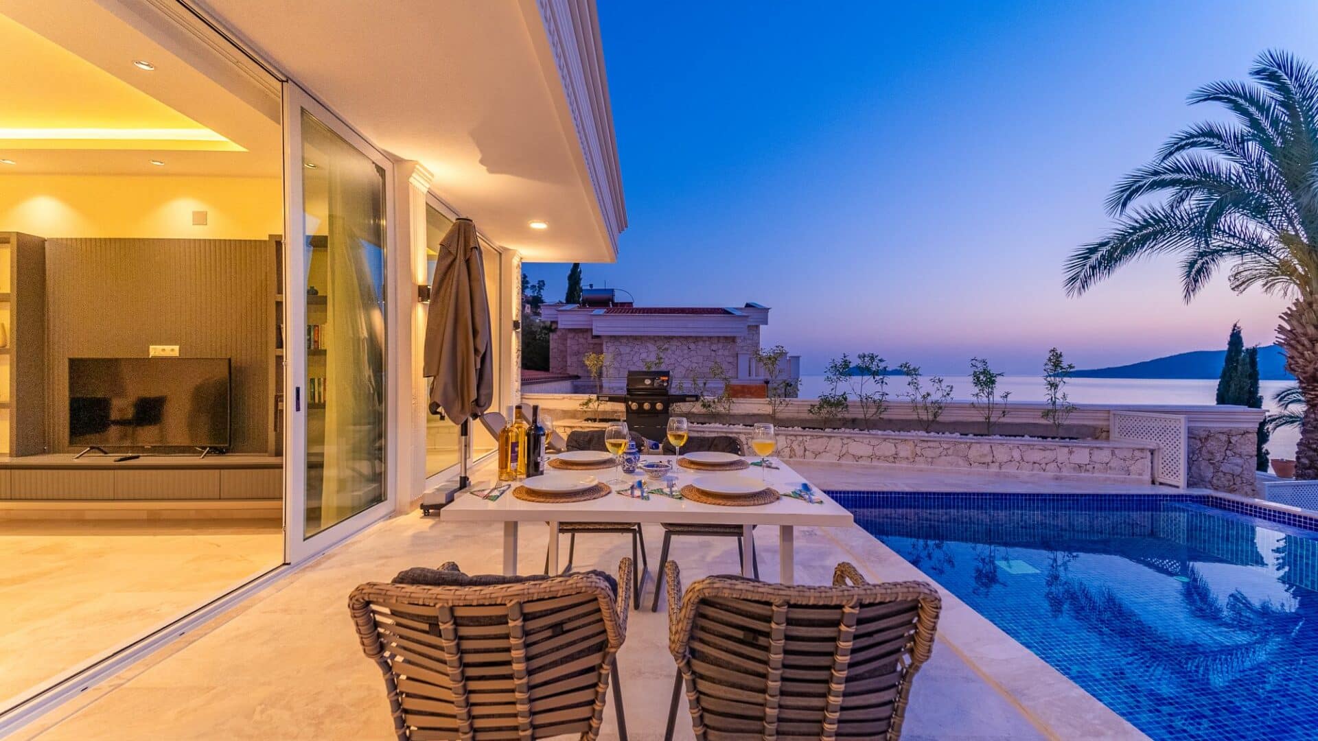 Villa Bahce Kalkan alfresco dining terrace and dusty pink skies