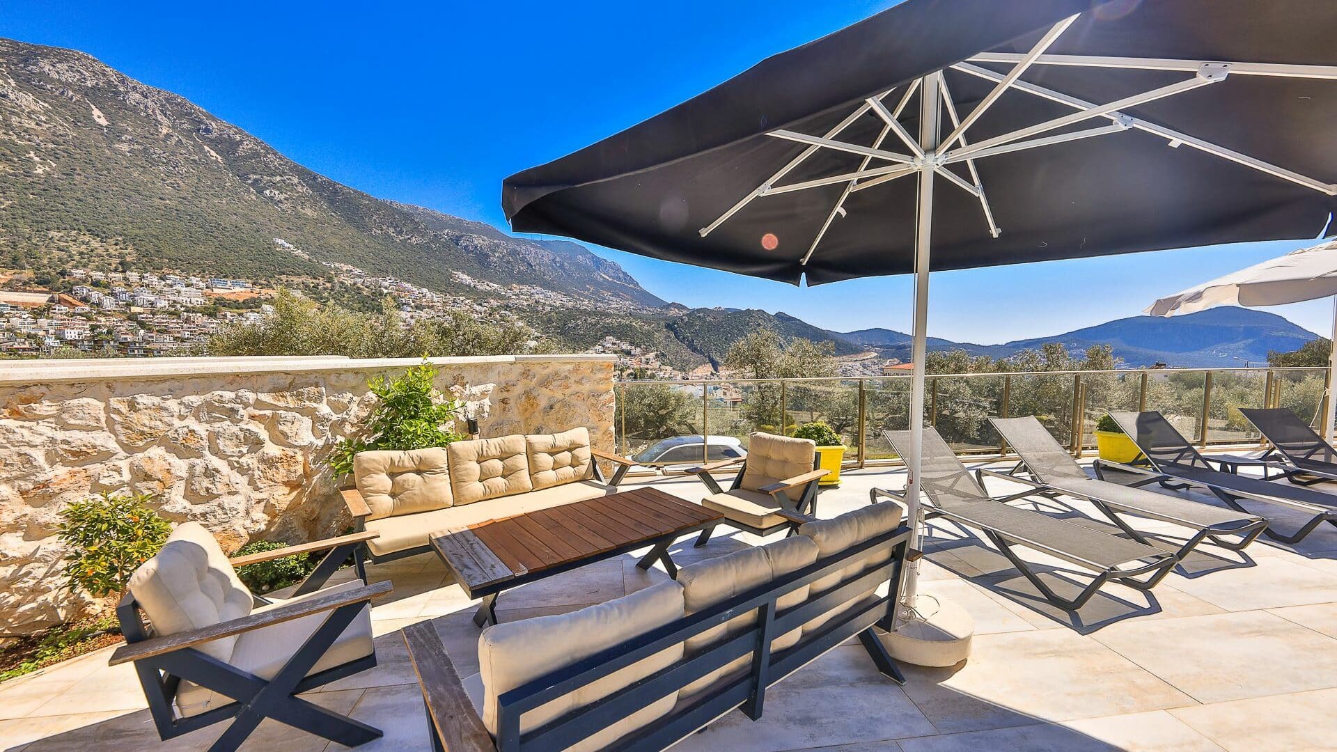 Villa Elia Kalkan comfy seating area under the shade of a pergola