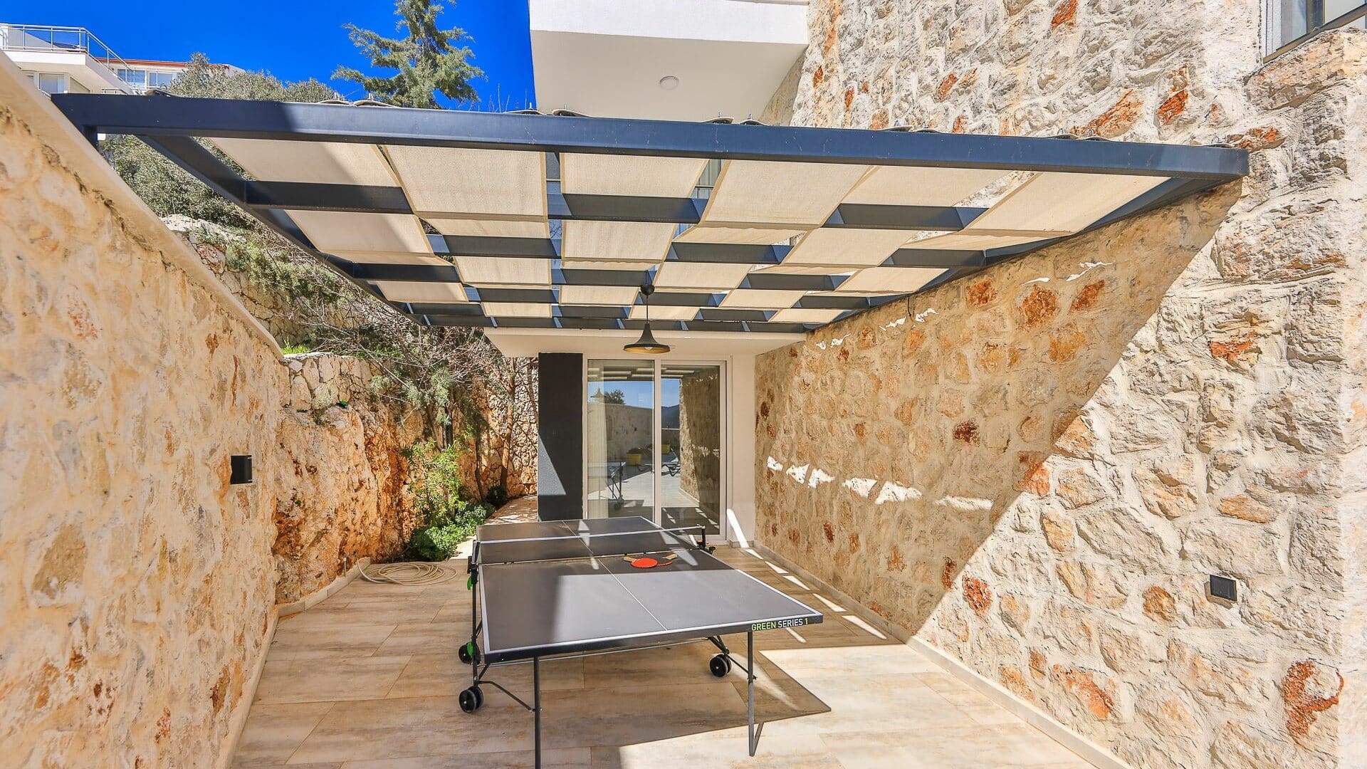 Villa Elia Kalkan table tennis under the shade of a pergola