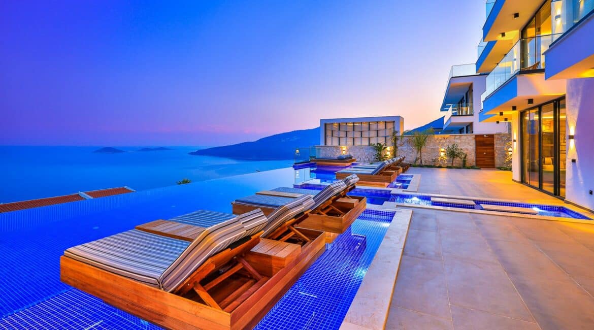 Villa Overseas Kalkan exterior or the house by night and views out to sea at dusk