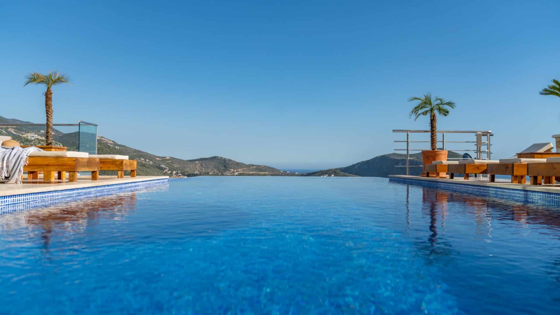 Villa Aslan Kalkan swimming pool blue skies and mountain views