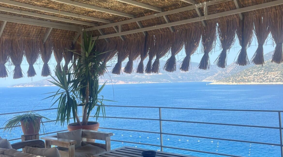 Zest Beach Club entrance in Kalkan with elegant seating area, panoramic sea views and clear blue skies on Turkey’s Turquoise Coast.