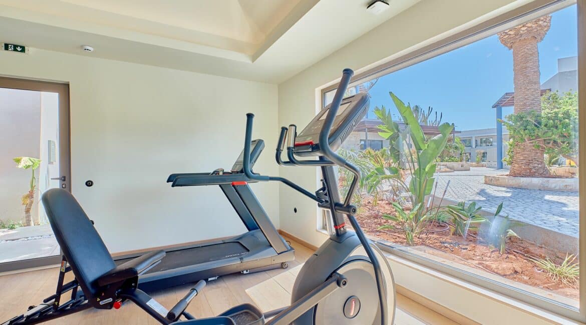 Paralos Kosta Alimia Crete Gym with large windows imbibing the surrounds