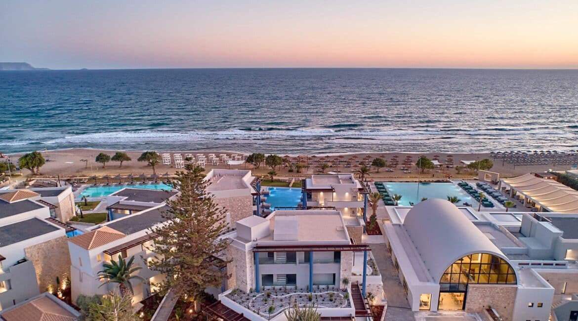 Paralos Kosta Alimia Crete dusty pink skies aerial footage of the hotel