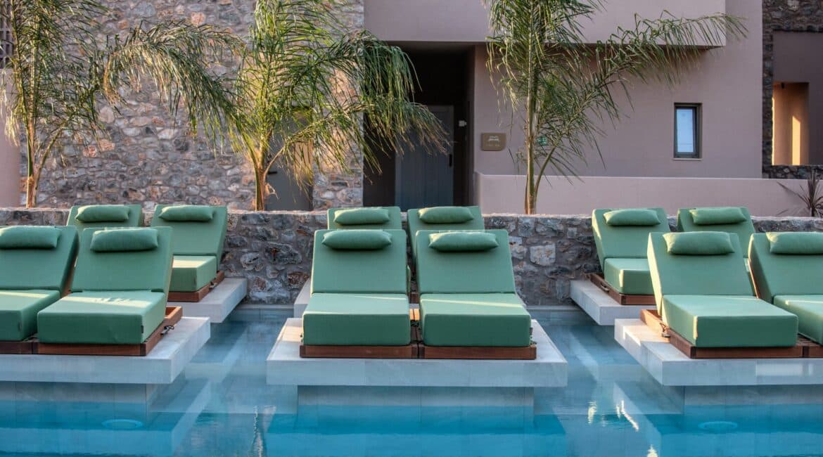Paralos Venus Suites Crete day beds by the pool