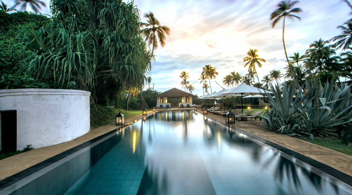 The Villa Bentota main swimming pool and leafy surrounds