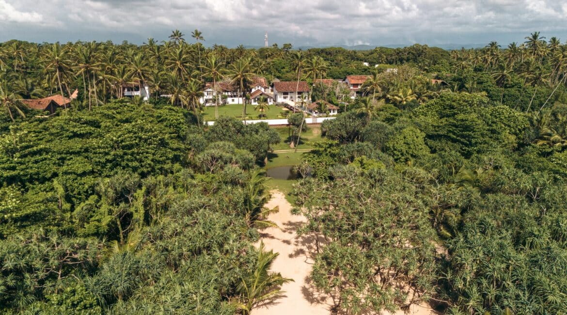 The Villa Bentota pathway onto the beach surrounded by jungle