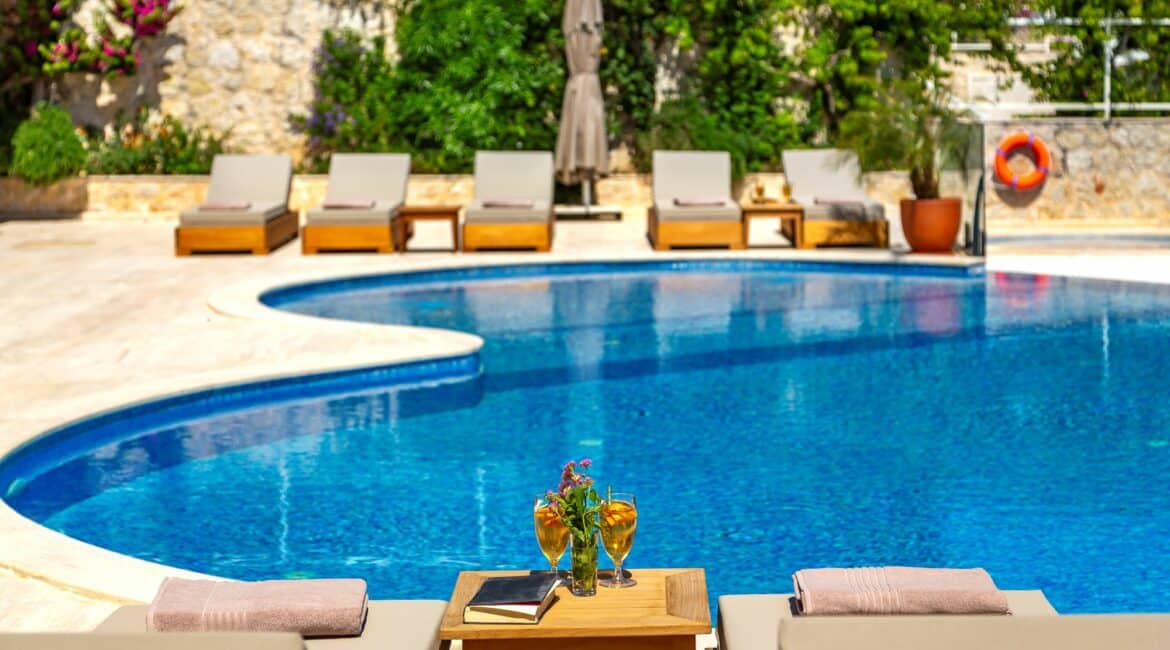 Villa Guney Exclusive 5 bedroom villa Kalamar Bay Kalkan beautiful swimming pool and surrounding day beds for loafing and lounging
