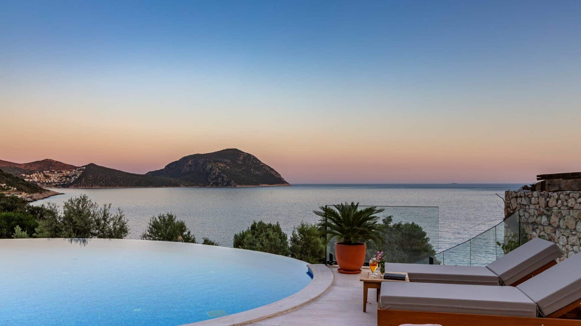 Villa Guney Exclusive 5 bedroom villa Kalamar Bay Kalkan dusty pink skies and infinity pool