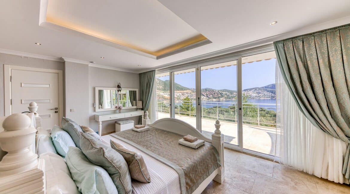 Villa Oasis Kalkan Master Bedroom leading onto spacious balcony with wide screen sea views