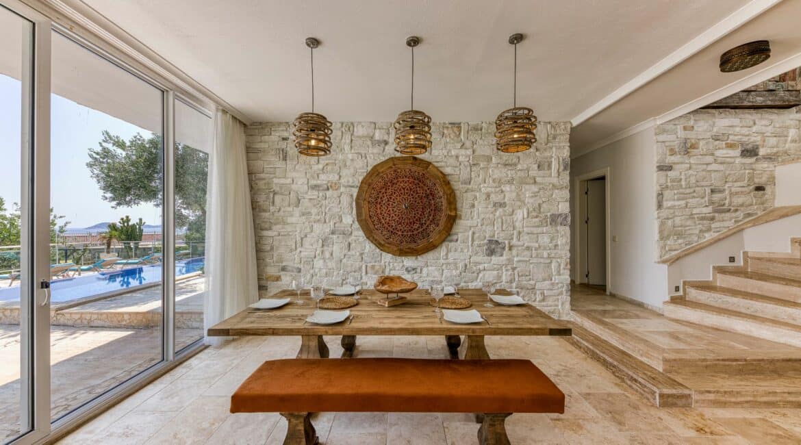 Villa Oasis Kalkan dining area and staircase leading to the first floor