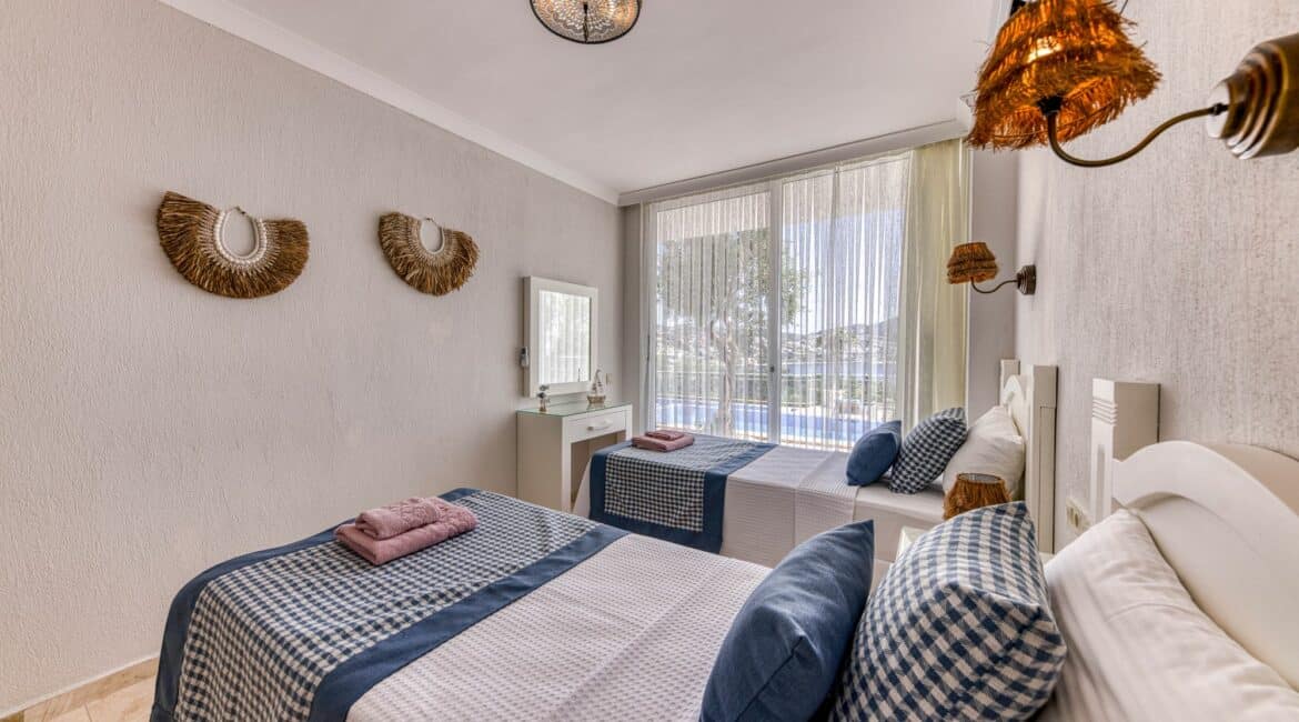Villa Oasis Kalkan second tiwn bedroom on the ground floor with views over the pool terrace