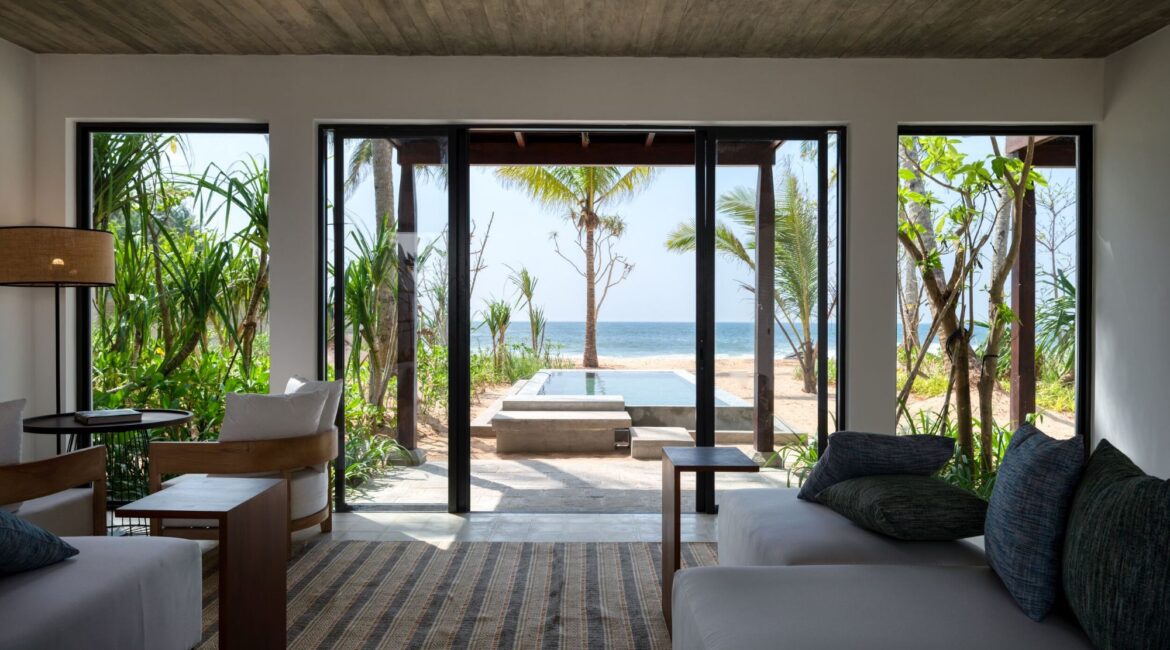 Bay View Pool Suite at Ahu Bay Sri Lanka with a private plunge pool, outdoor timber deck, tropical garden views, and elegant interior living space opening to the terrace.