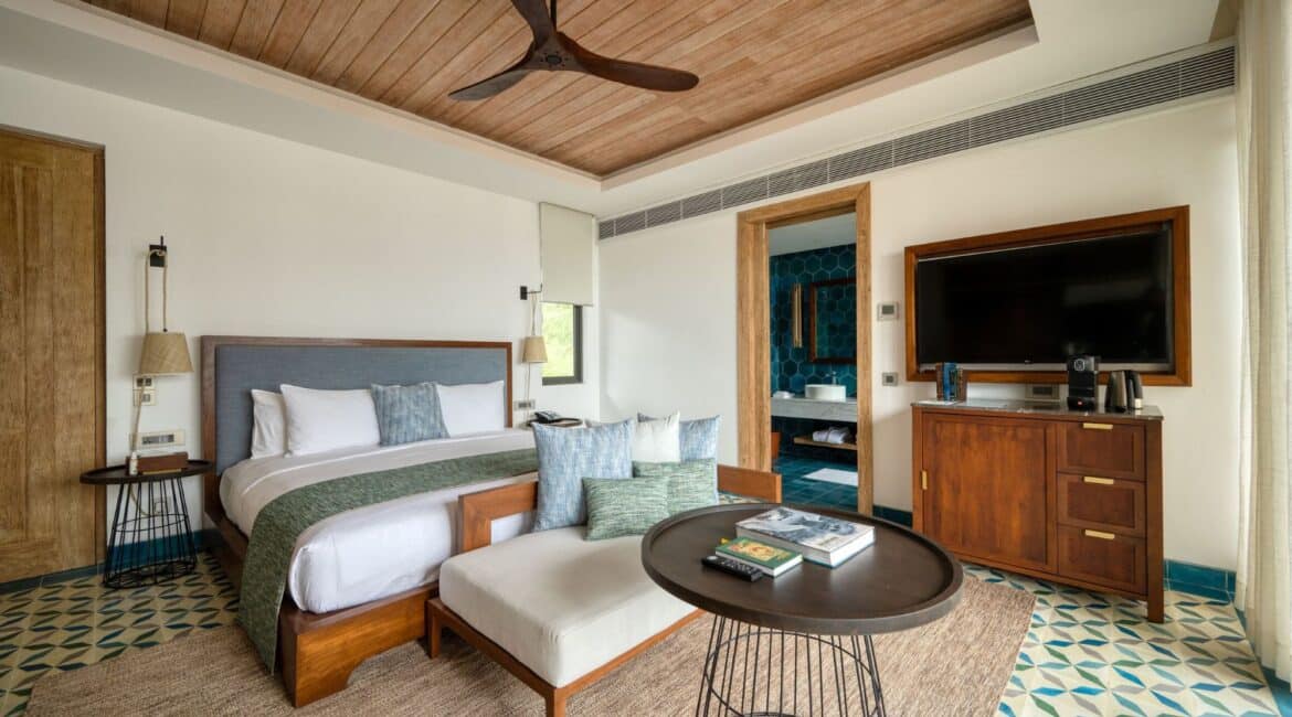 Bay View Room at Ahu Bay Sri Lanka leading into an en suite bathroom with a walk-in shower and WC.