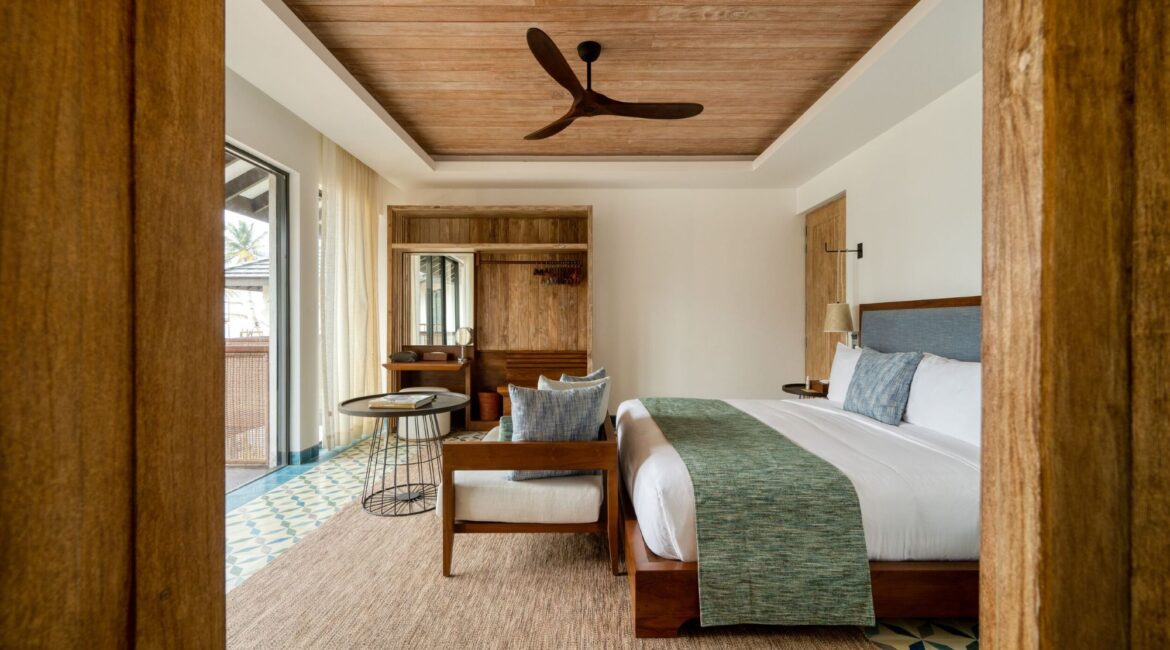 Bay View Room at Ahu Bay Sri Lanka featuring a comfortable sleeping area with a king-size bed and soft neutral décor.