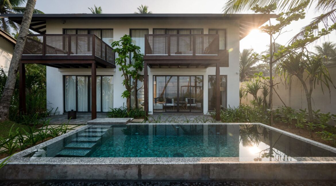 Bay View Pool Residence at Ahu Bay Sri Lanka featuring a spacious living area, private plunge pool, tropical garden views, and upper-floor bedrooms with balconies overlooking the ocean.