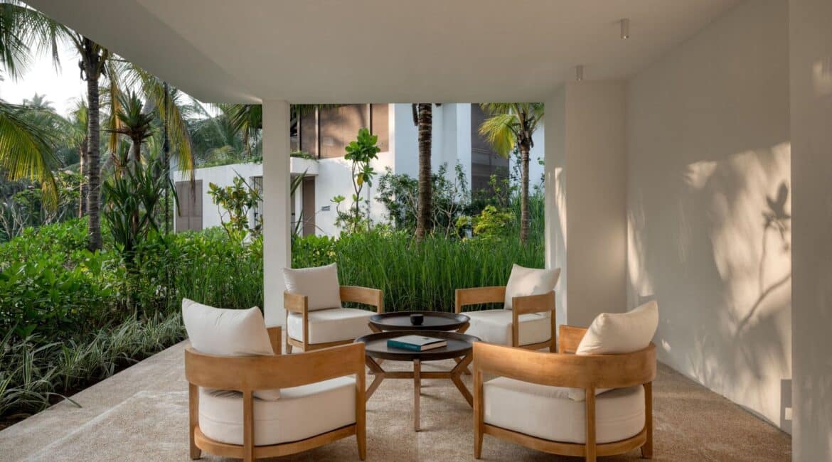 Furnished verandas at Ahu Bay Sri Lanka with comfortable seating and views of the tropical gardens and ocean.