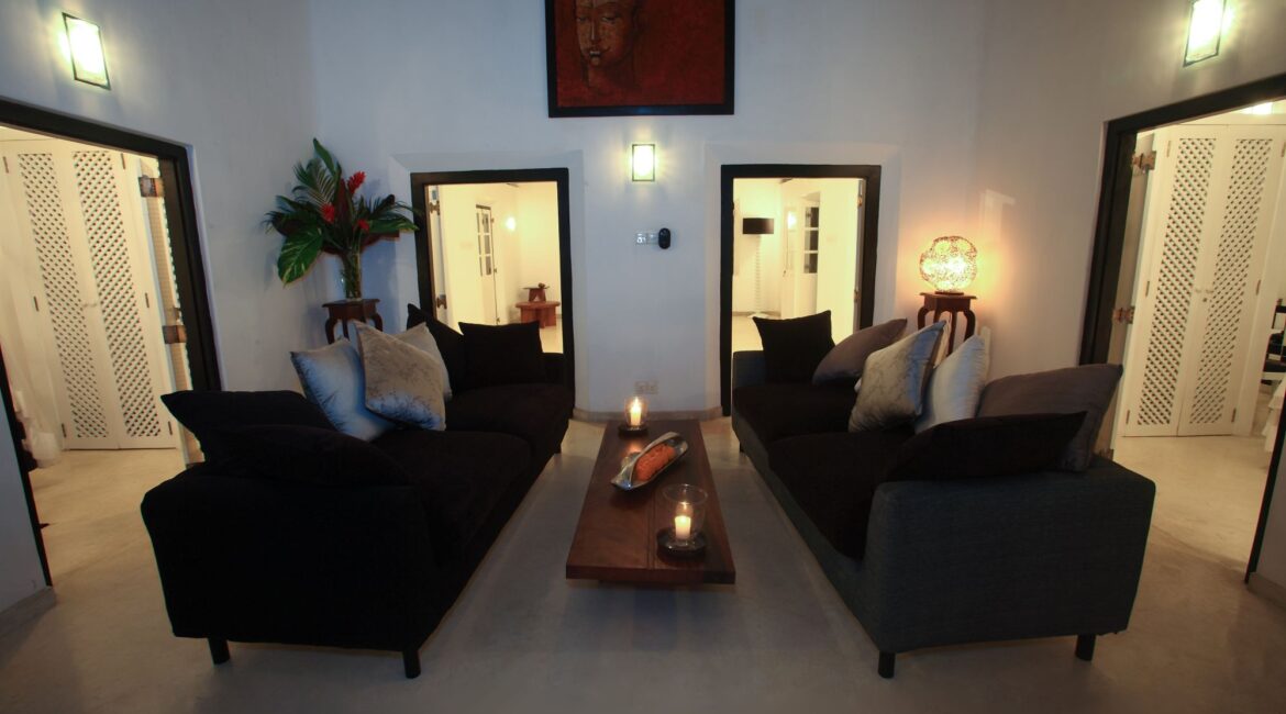 Elegant lounge area at Coco Tangalla near Tangalle, Sri Lanka, with plush sofas and a stylish, cosy atmosphere.