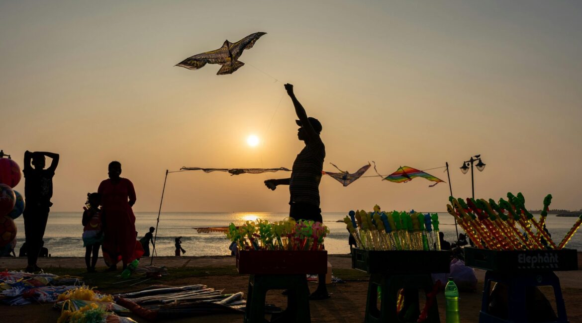 hildren flying kites on the golden shores of Colombo, Sri Lanka’s western coast – a joyful glimpse into local life on a Sri Lanka holiday