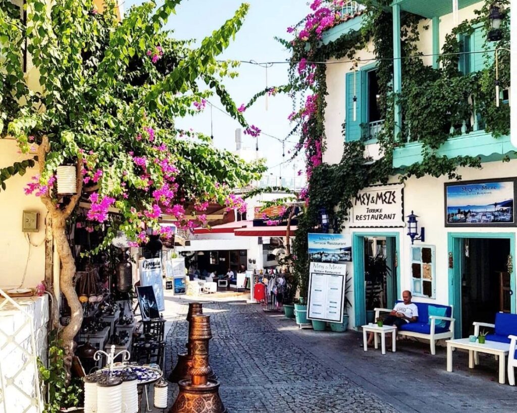 Kalkan Old Town rooftops in July with whitewashed houses and views of the old streets
